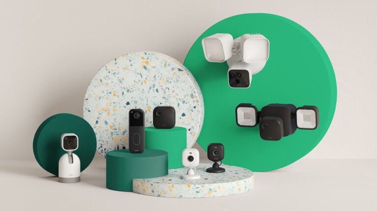 Blink Smart home security devices displayed on green and terrazzo-style platforms