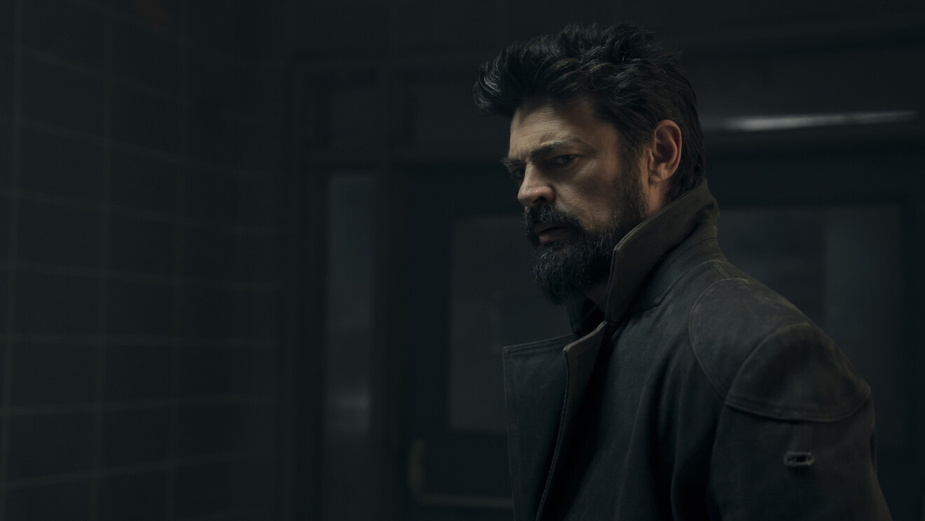The Boys: Rugged man with beard in dark jacket, contemplative side profile