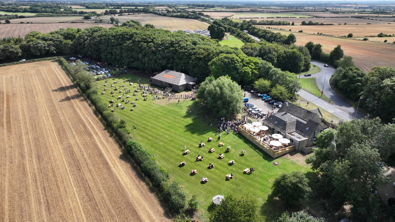 The Farmer's Dog in Burford, Jeremy Clarkson's proper British pub from Clarkson's Farm season 4, as seen from a drone