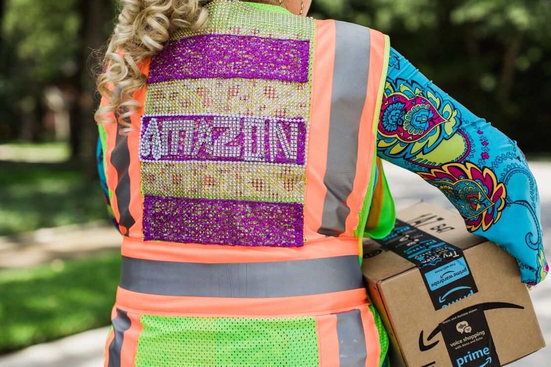 A woman in a bedazzled Amazon Flex vest.