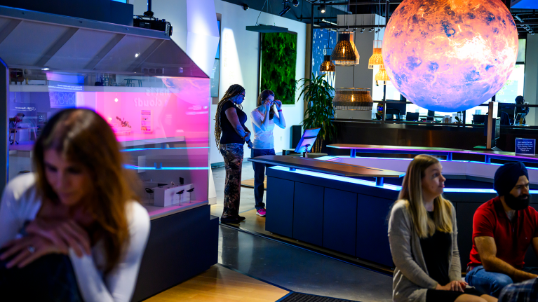 Learners building cloud computing skills and exploring career opportunities at an AWS Skills Center.