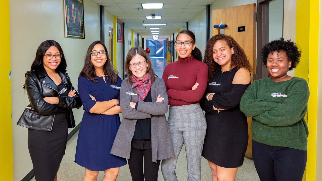 Amazonian Ardine Williams vice president of people operations speaks with students studying STEM education. 
