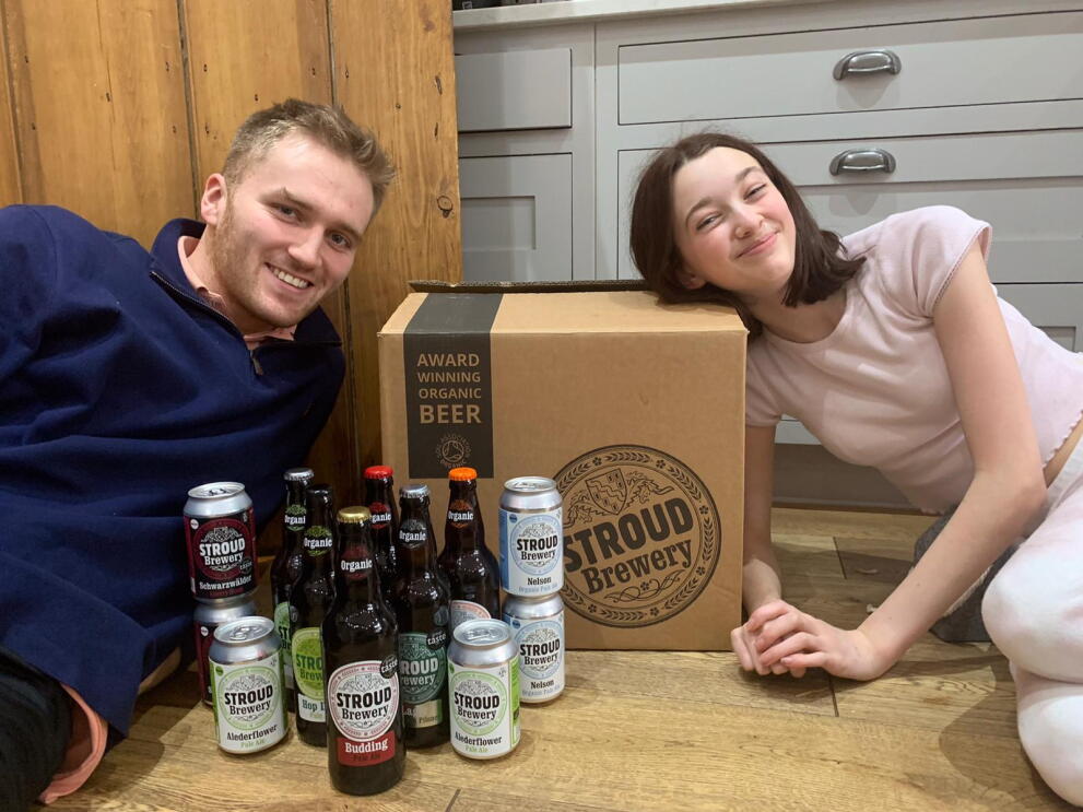 Campus challenge runners up in front of their products from STROUD Brewery.