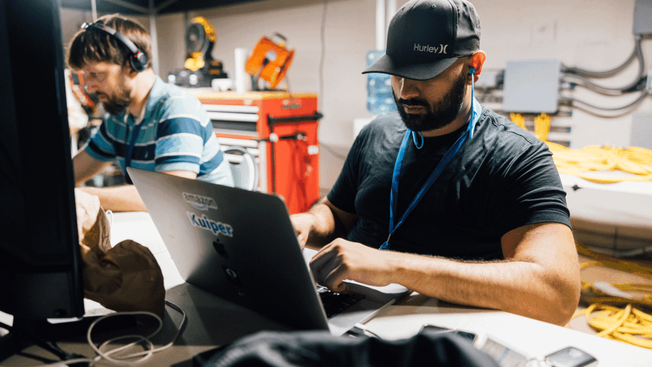 An image of the Kuiper team testing their bandwidth for the prototype satellites.