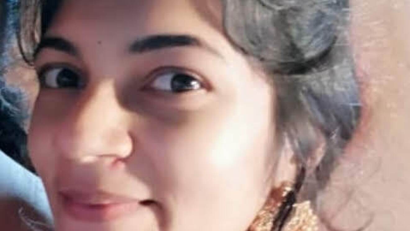 This is a close up pic of Sonu smiling into the camera wearing an Indian attire
