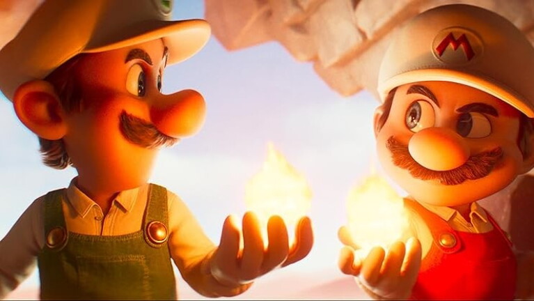 Mario and Luigi both hold a fireball in their hands and look at each other mischievously
