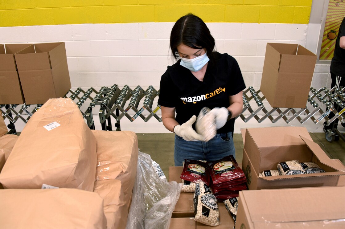 Faces of Amazon associates working at Amazon fulfillment centers