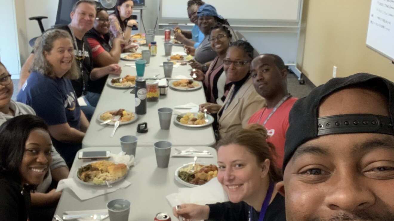 Amazon associates at CLT celebrate with a meal.