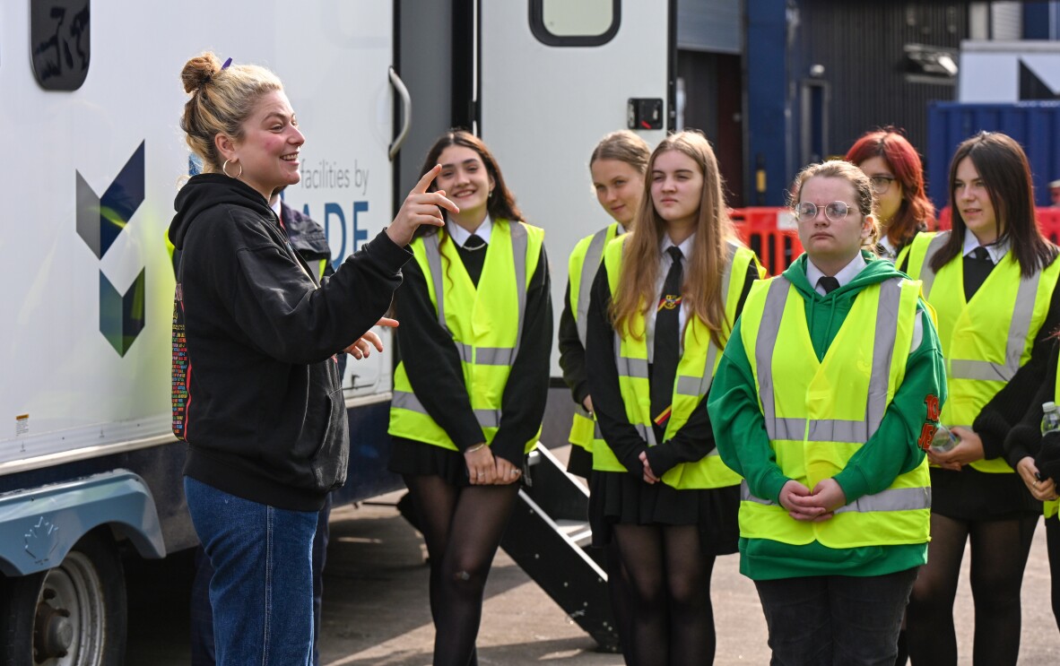 Hannah Wright, Base Runner, on-set with students