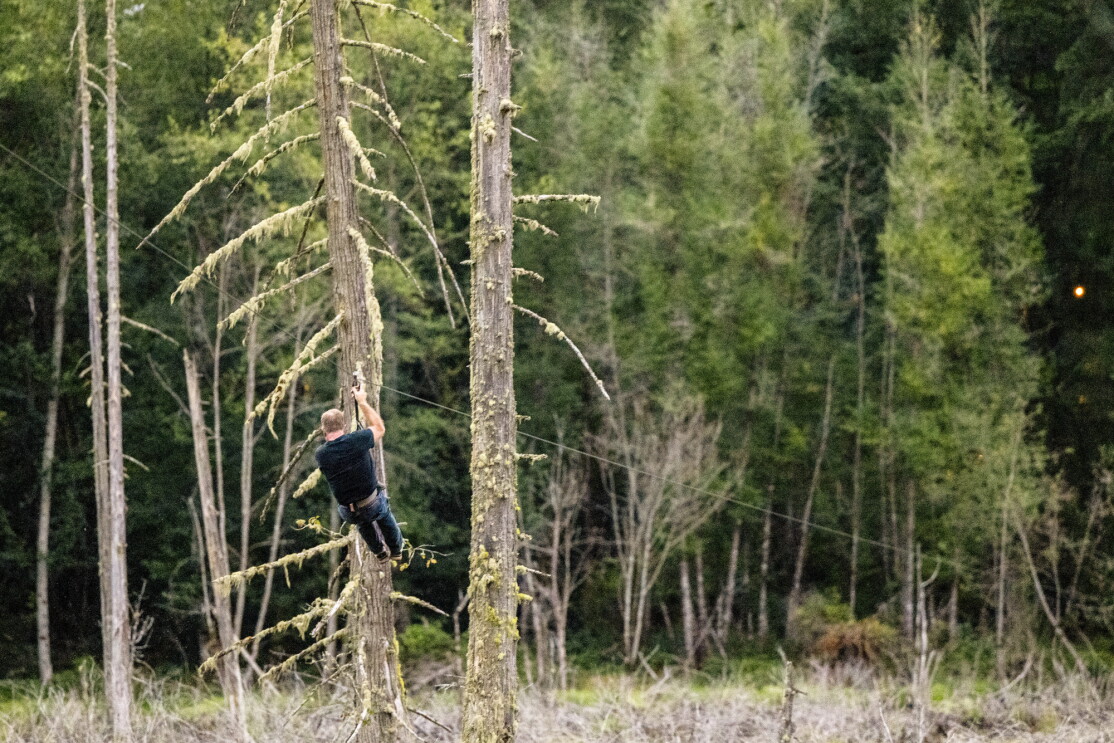 A person zip lining.