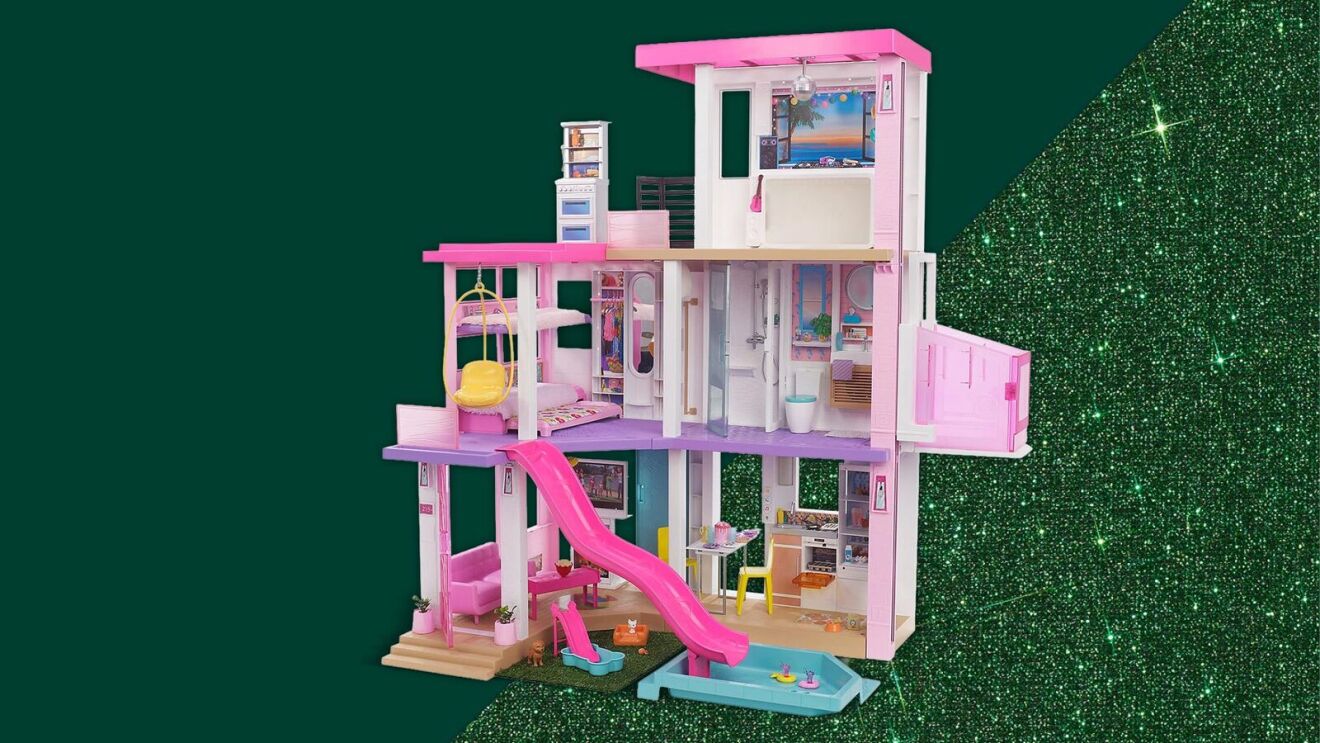 Colorful multi-story Barbie Dreamhouse playset with pool and slide