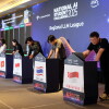 ASEAN LLM League - Participants coding on stage