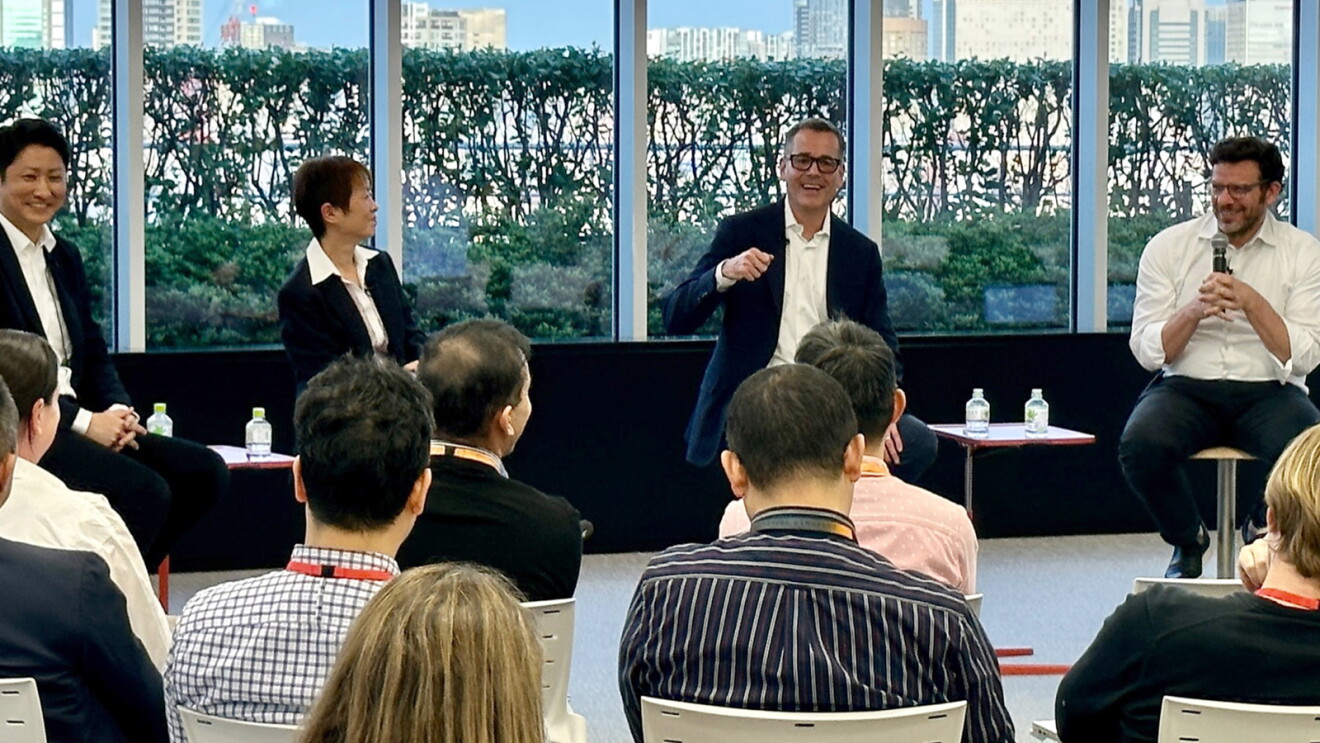 An image of Amazon Stores CEO, Doug Herrington, visiting Amazon employees in Japan.
