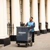 Delivery Driver, Chris, engaged by Delivery Service Provider, MSC Logistics Limited, making on-foot-deliveries in London using a pushcart.