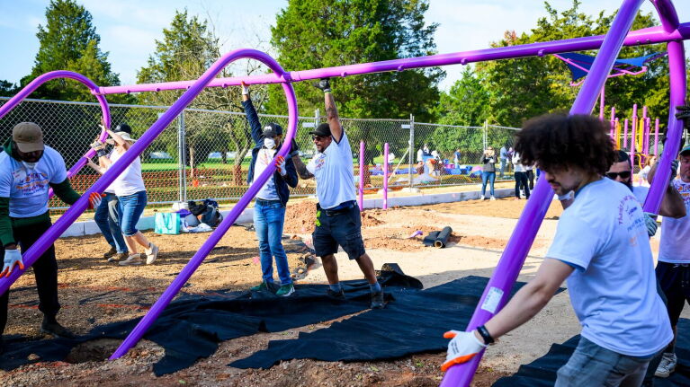Volunteers constructing the playground at Fairmont Park in Virginia.