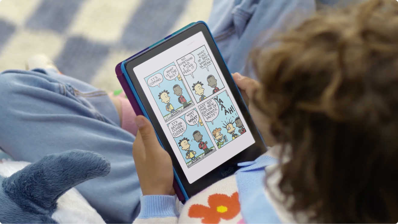 Child reading comic book on Kindle Colorsoft for Kids