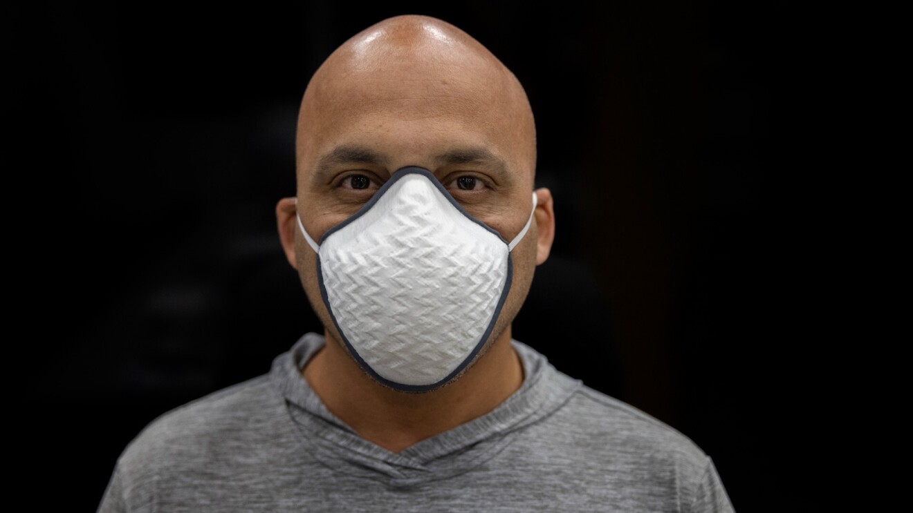 Tushar Mahale wears a face mask.