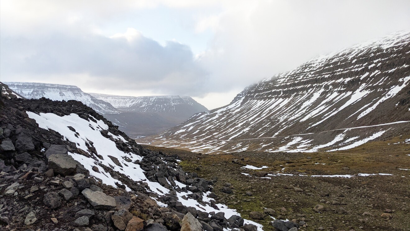 A picture of mountains covered with Snow in Iceland. 