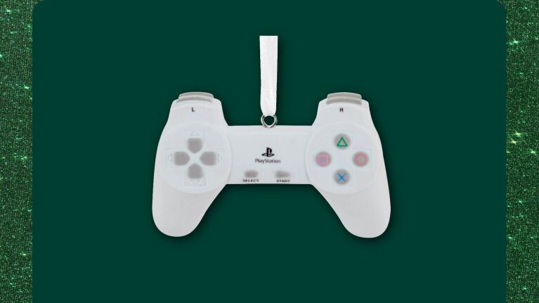 PlayStation controller ornament on green background