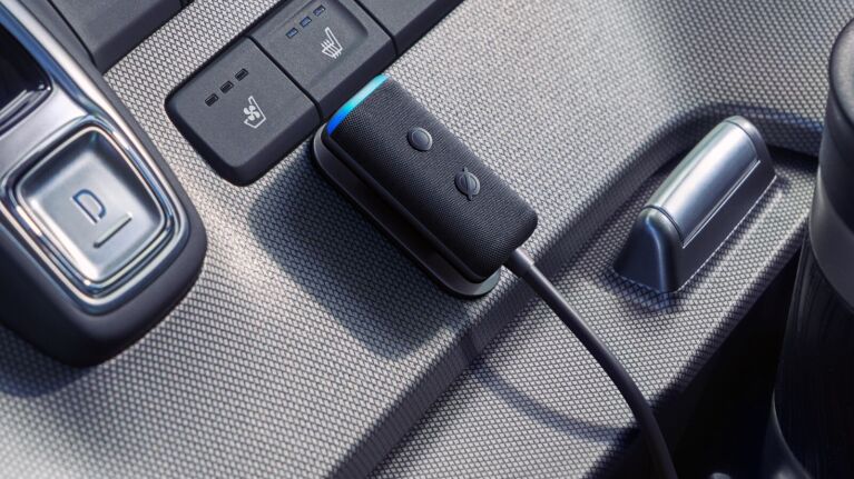 Amazon Echo Auto on a car's dashboard.