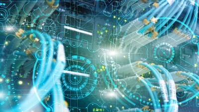 An image of data servers with a blue overlay of cog designs on top of the image.