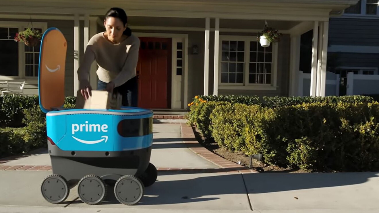 A woman reaches into to Scout to retrieve a package. 