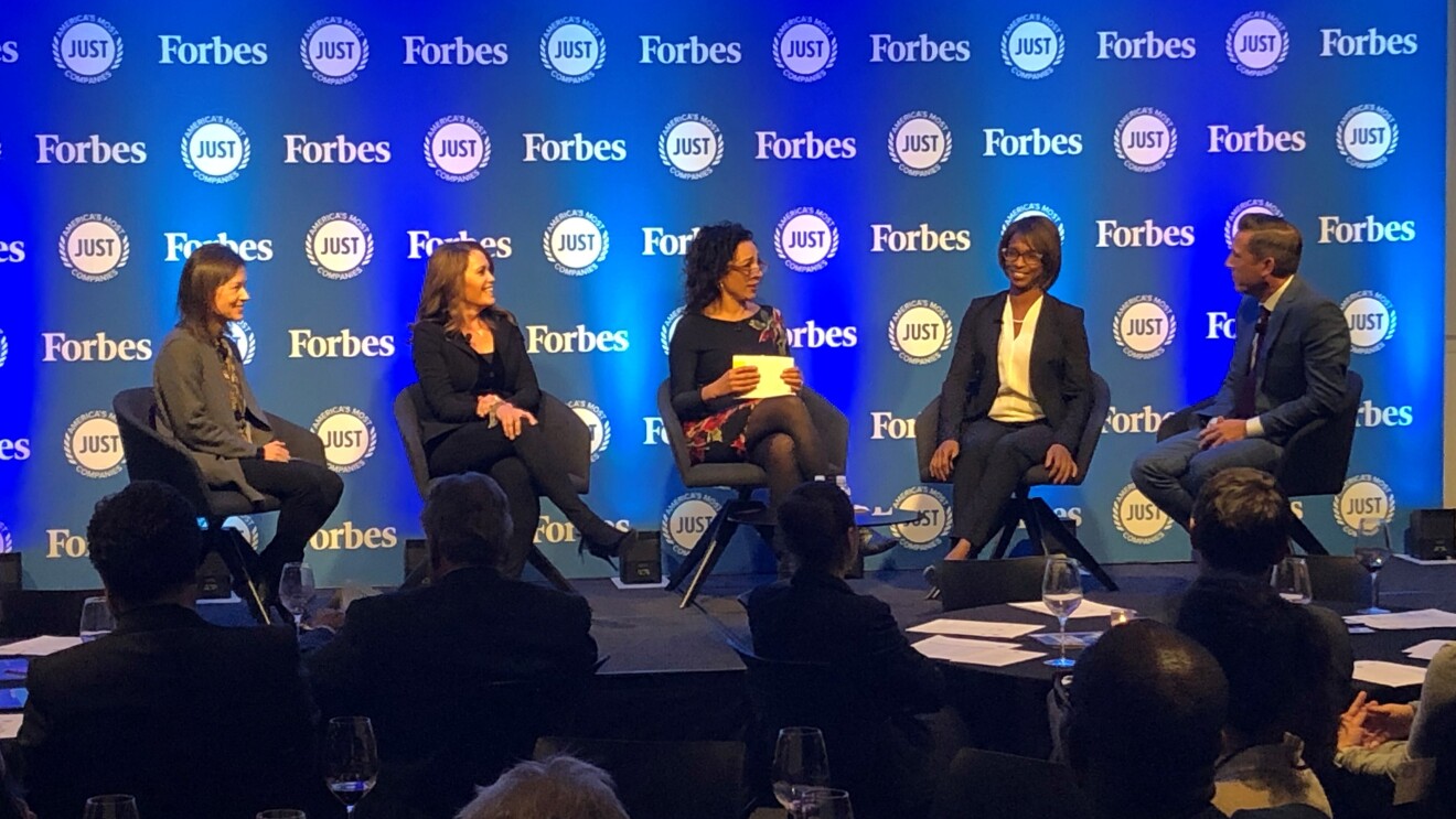 A panel at the JUST Capital awards dinner, featuring Amazon's Ardine WIlliams, alongside four other individuals.