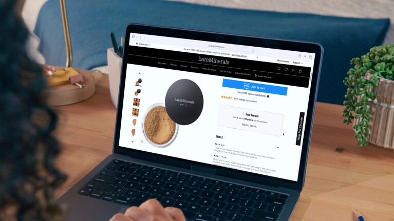 Laptop displaying bareMinerals makeup page with buy with prime feature