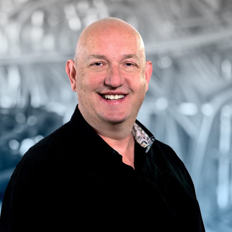 A headshot of Tye Brady