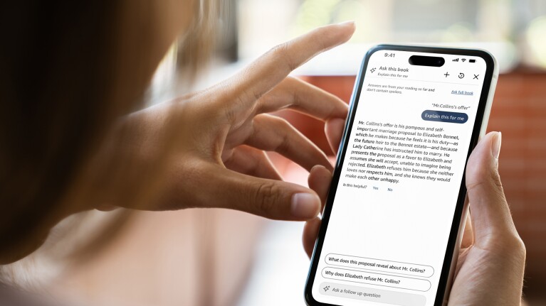 Hands holding smartphone displaying Kindle Ask this Book AI analysis chat interface