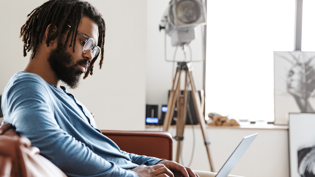 Men working on a laptop