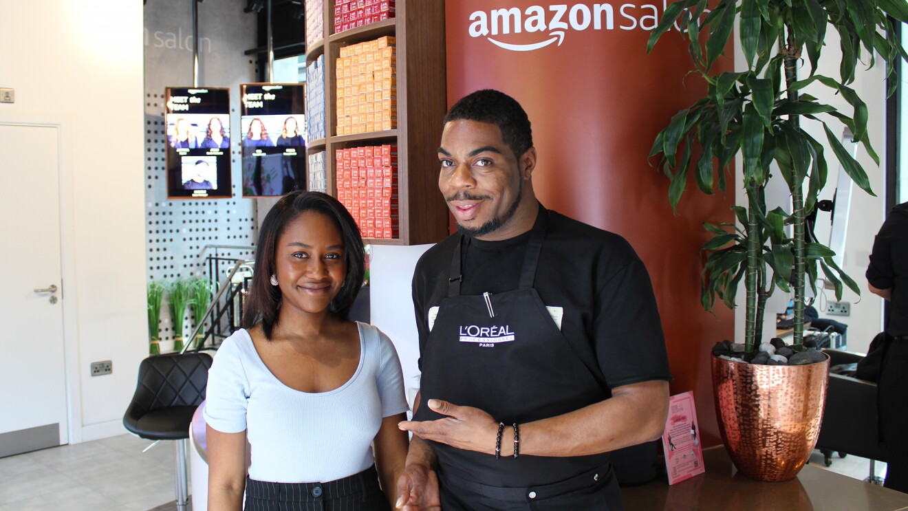 Korell and Melissa standing inside Amazon Salon