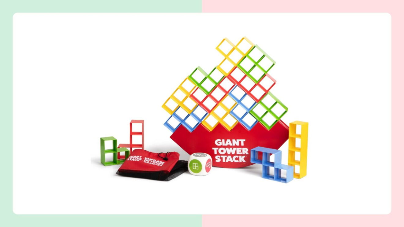 Giant Tower Stack game with colorful plastic pieces and die