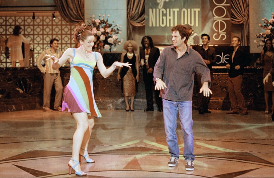 A man and a woman on the dancefloor 