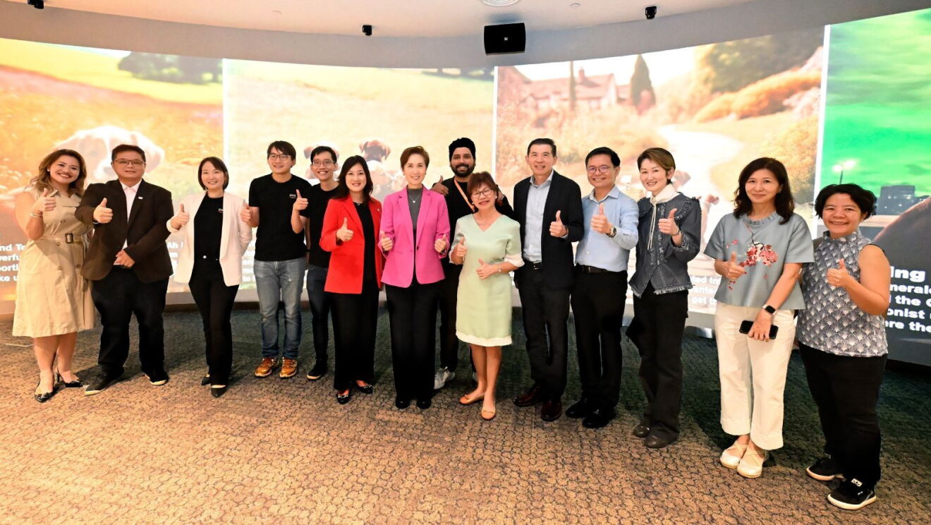 StoryGen featured in the Central Public Library’s Immersive Room with Elsie Tan, Country Manager, Worldwide Public Sector, Singapore at AWS, Ng Cher Pong, Chief Executive Officer at NLB, and Gene Tan, Chief Innovation Officer at NLB with Guest-of-Honor Josephine Teo, Minister for Communications and Information, Singapore.