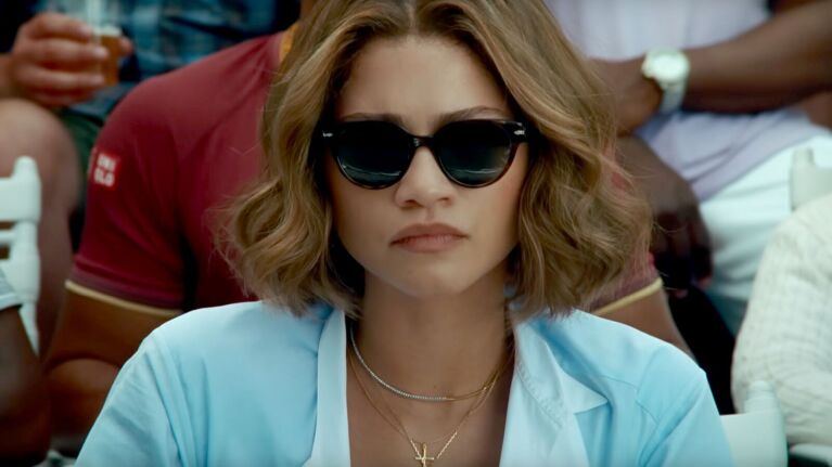 Actress Zendaya wears sunglasses in a scene from "Challengers."