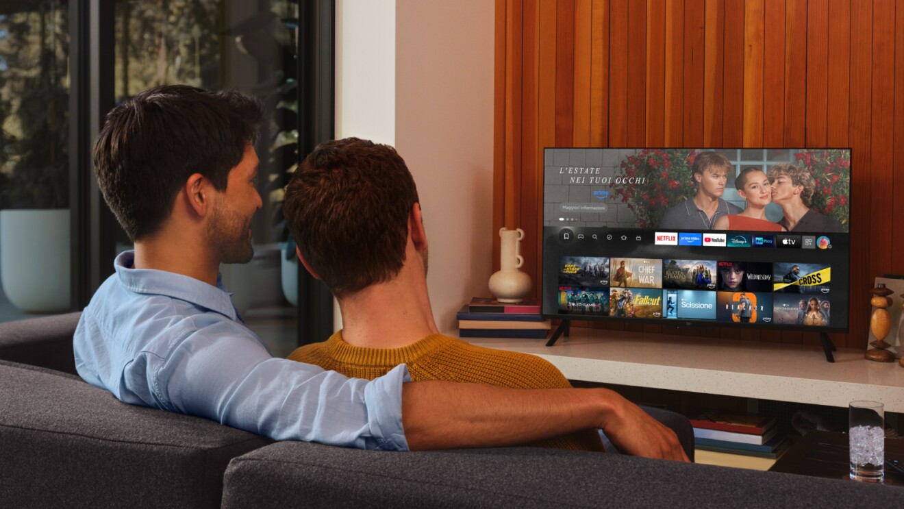 Two men watching Prime Video on their television via Alexa+