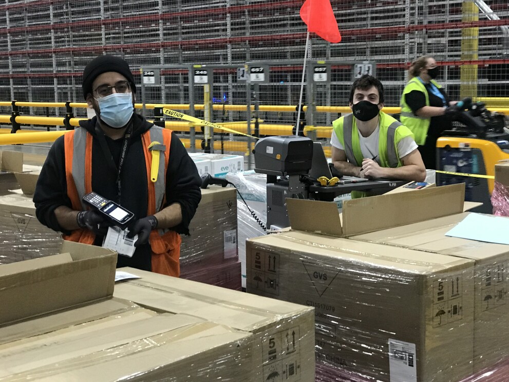 Amazon employee working at a fulfillment center