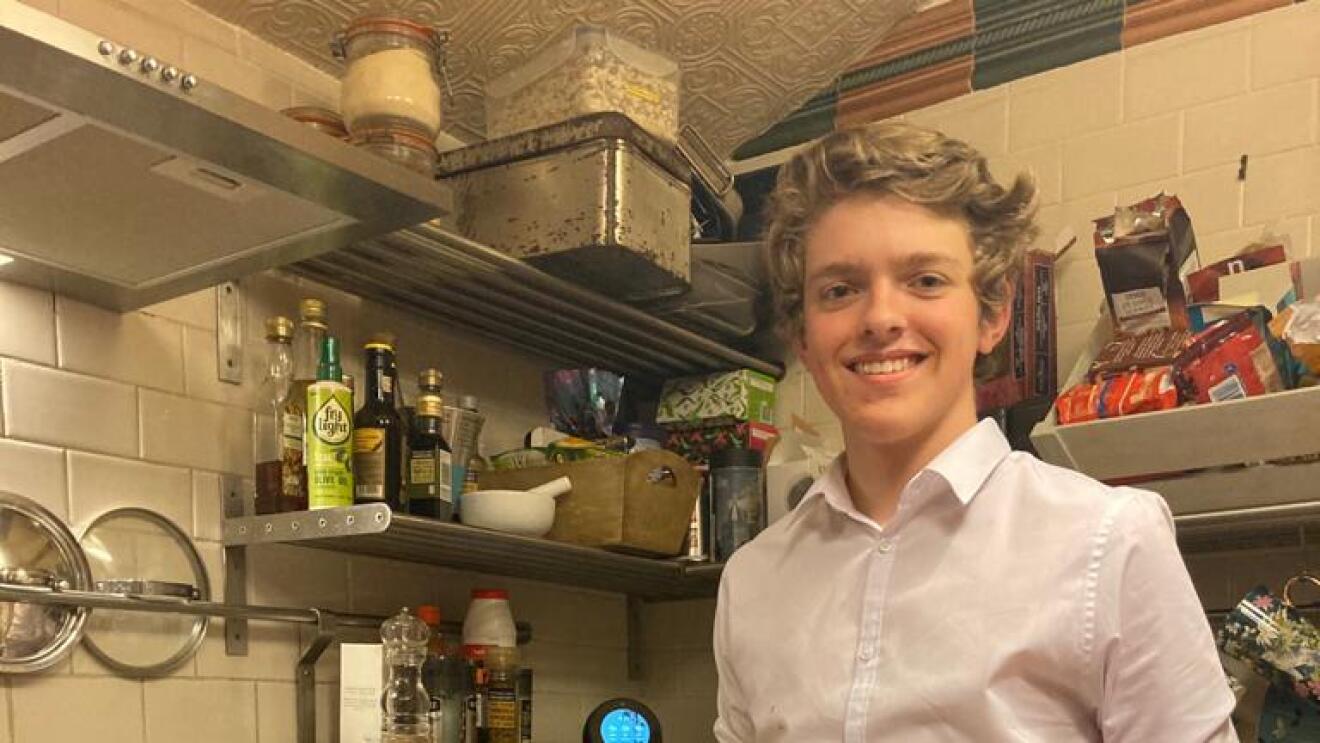 Harrison with a cooking pan