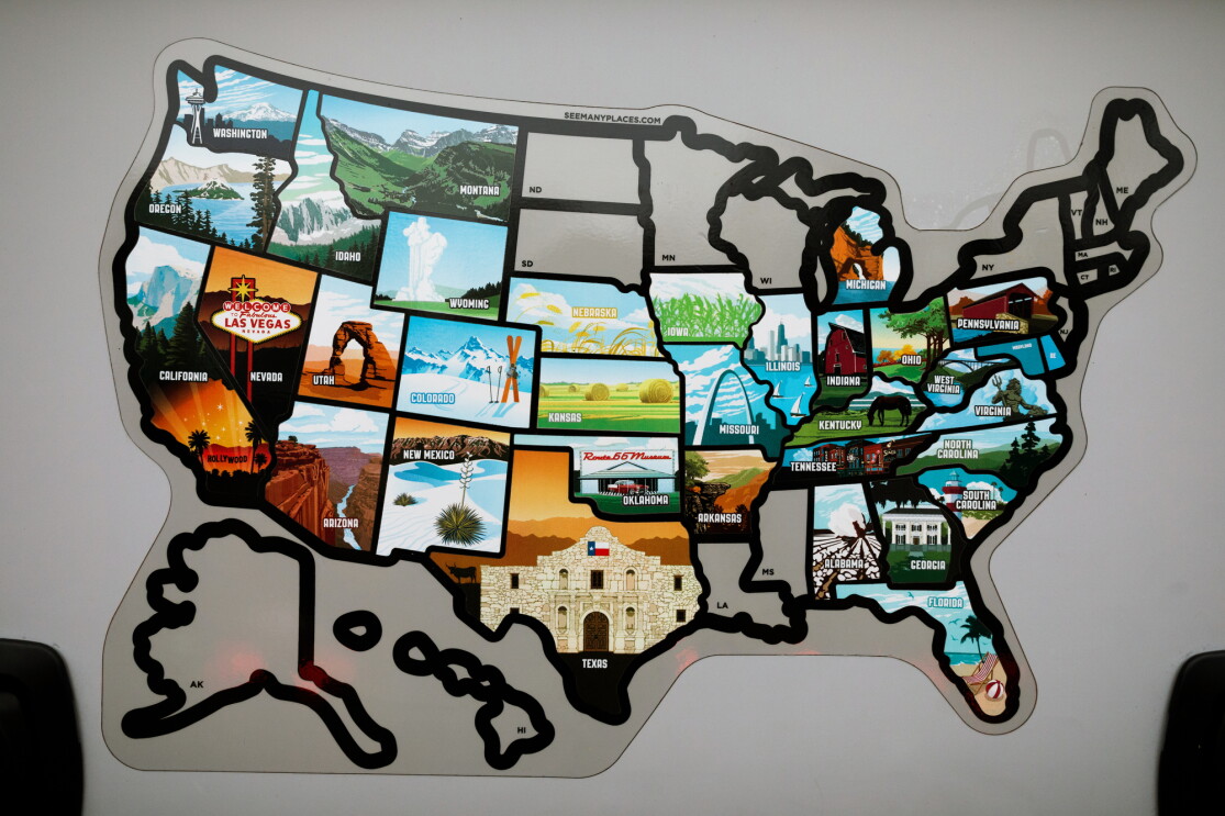 An outline map of the United States. Most states are filled in with stickers.