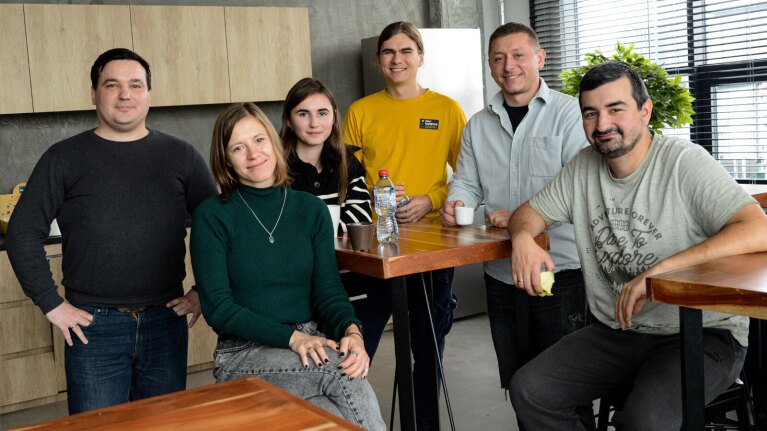 An image of employees in the AWS training programs