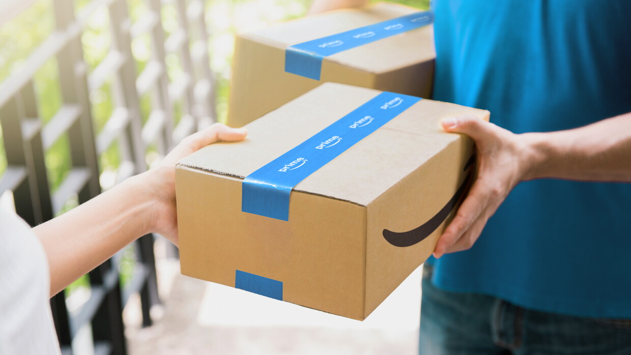 Hands holding Amazon delivery