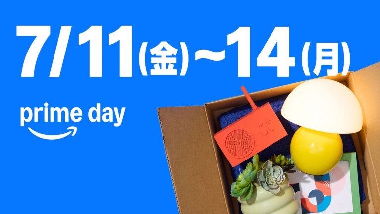 真っ青な背景、上側に白い字で大きく「7/11(金)~14(月)」と書かれ、その下にPrime dayのロゴ。右下には開いた段ボール箱があり、中にオレンジ色のラジオ、黄色と白のランプ、多肉植物などのカラフルな商品。