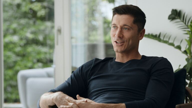International football star Robert Lewandowski talks during an interview.