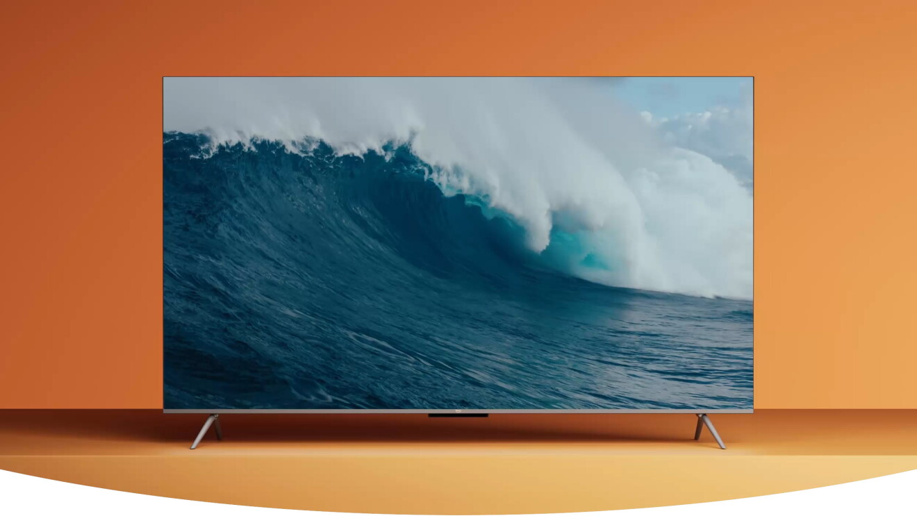 Image of a Fire TV in front of an orange background