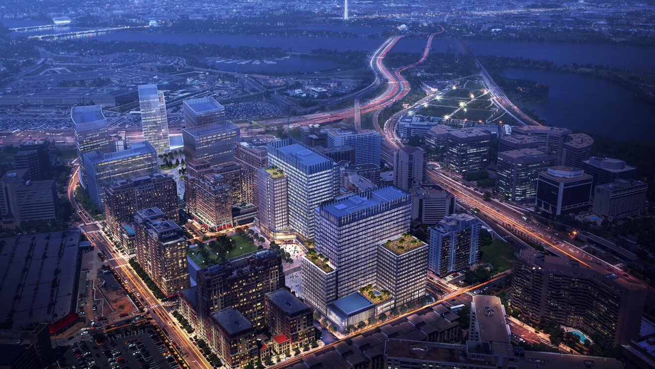 从空中俯瞰亚马逊阿灵顿园区的夜间效果图。