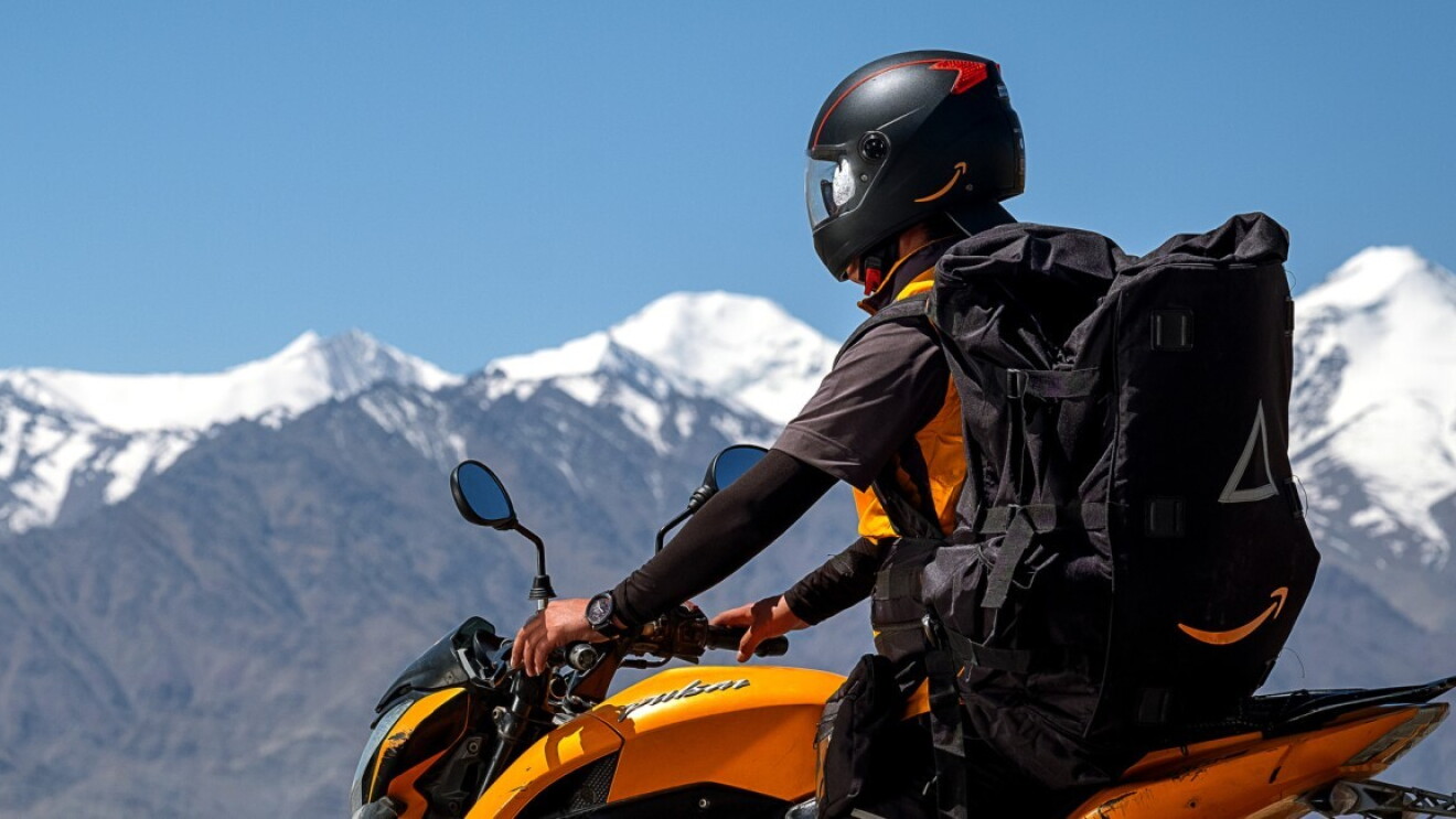 A Delivery Associate makes a delivery at Leh