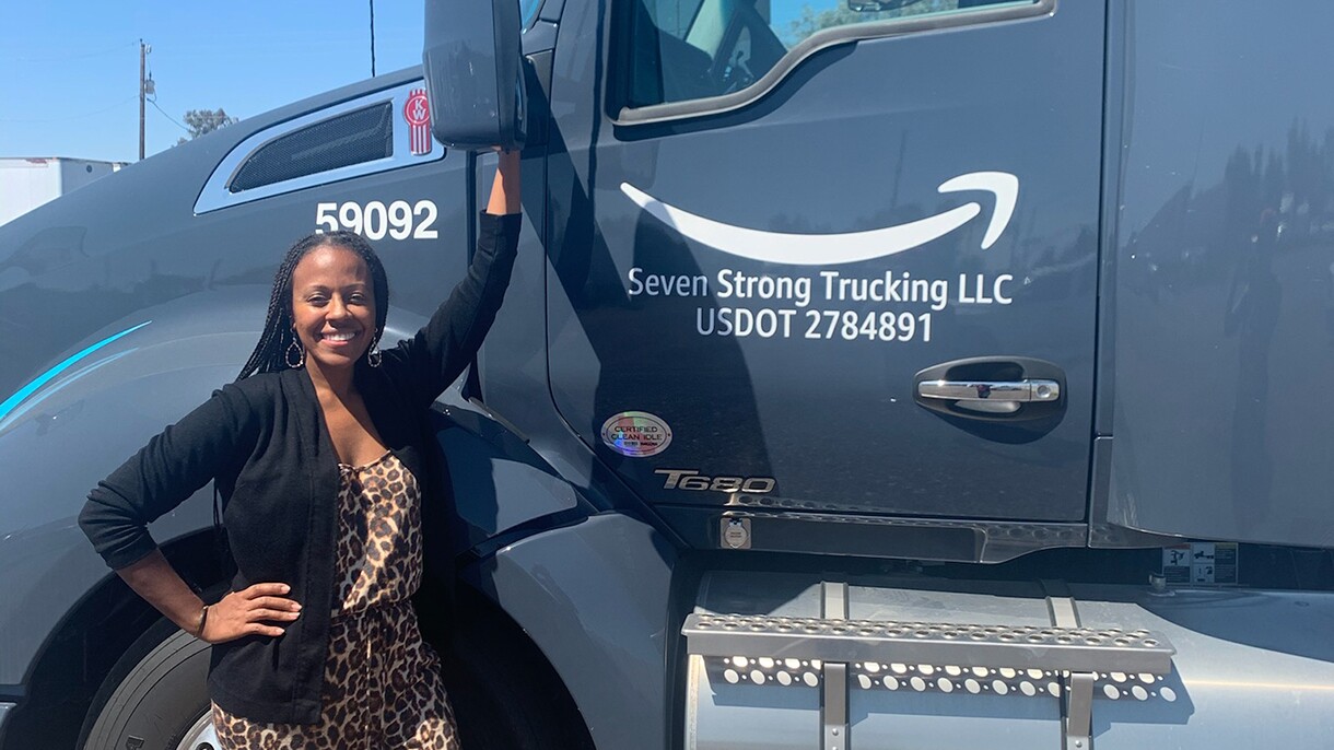 An image of a Black woman who is leading a company that supports Amazon's middle and last mile logistics operations. 