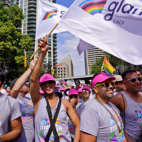 A photo of people walking in the 2022 Amazon Toronto Pride parade.