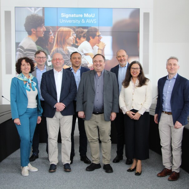 AWS and University of Luxembourg leaders after signing the MoU.